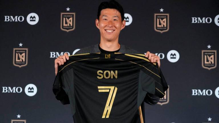 Son Heung-min poses during an LAFC introductory press conference at BMO Stadium. Mandatory Credit: Kirby Lee-Imagn Images