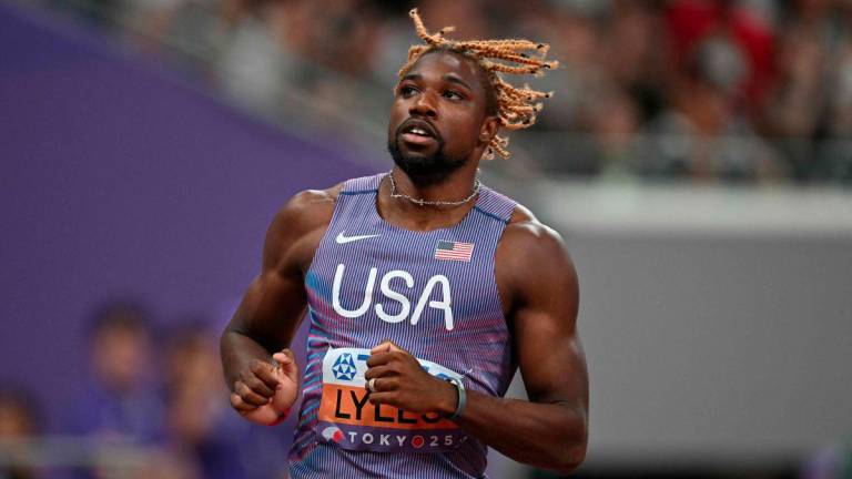 US sprinter Noah Lyles celebrates after competing in the men's 100m heats during the World Athletics Championships in Tokyo on September 13, 2025. - AFPPIX