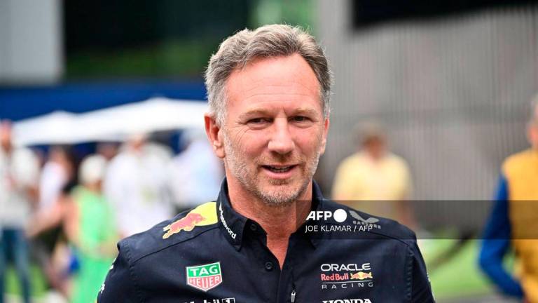 Red Bull Racing's British team principal and CEO Christian Horner reacts prior to the third practice session at the Red Bull Ring race track in Spielberg, Austria, on June 28, 2025, ahead of the Formula One Austrian Grand Prix. - AFP