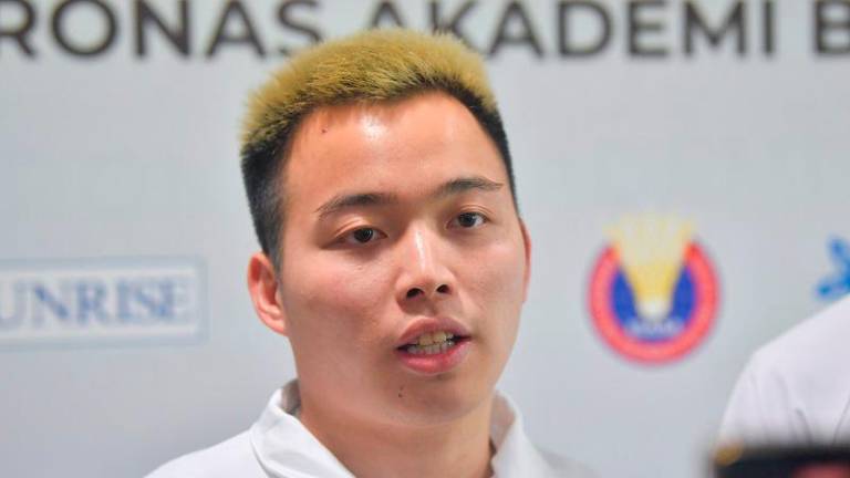 Pemain beregu lelaki badminton kebangsaan Aaron Chia. - fotoBERNAMA