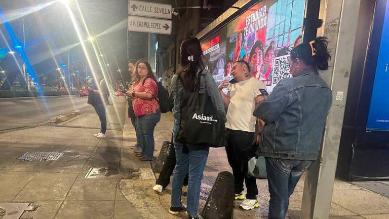 People wait outside their homes and buildings after an alarm warning of a tremor sounded, in Mexico City, Mexico, March 14, 2025. - REUTERSPIX