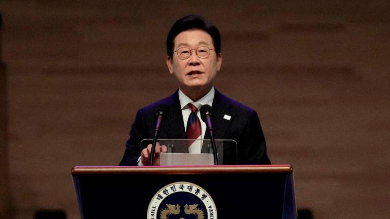 South Korean President Lee Jae Myung speaks during a ceremony to celebrate the 80th anniversary of Korea's liberation from Japanese colonial rule, in Seoul, South Korea, Friday, Aug. 15, 2025. - Pool via REUTERS