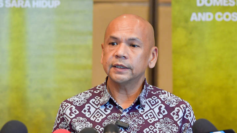 Minister of Domestic Trade and Cost of Living, Datuk Armizan Mohd Ali, at a press conference held in conjunction with the Engagement Session on the Review of E-Commerce Legislation at Zenith Hotel today. - BERNAMA