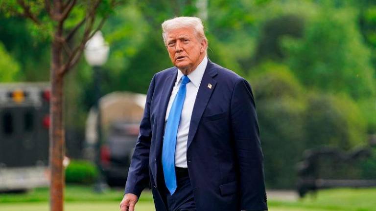 U.S. President Donald Trump walks to board Marine One to depart for Alabama, on the South Lawn of the White House in Washington, D.C., U.S., May 1, 2025. REUTERSpix