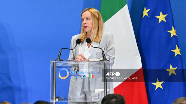 Italy’s Prime Minister Giorgia Meloni addresses the audience during a press conference with Ukraine’s President, as part of The Ukraine Recovery Conference 2025 (URC2025) at The Roma Convention Centre in Rome on July 10, 2025. - AFP