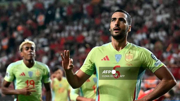 Spain's midfielder #06 Mikel Merino (R) celebrates after scoring Spain's fifth goal during the FIFA World Cup 2026 Group E qualification football match between Turkey and Spain at the Konya Buyuksehir Belediye Stadium, in Konya, on September 7, 2025. - AFP