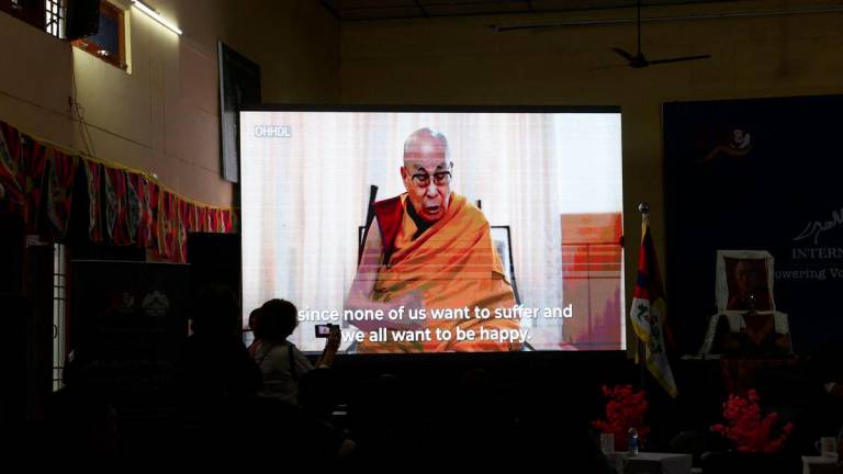 People watch a video message of Tibetan spiritual leader Dalai Lama at the International Tibet Youth Forum at Tibetan Reception Center in the northern hill town of Dharamshala, India, July 3, 2025. - REUTERSPIX
