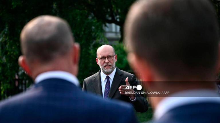 (FILES) Russell Vought, Director of the Office of Management and Budget (OMB), speaks to the press outside the White House in Washington, DC on June 3, 2025. - AFP