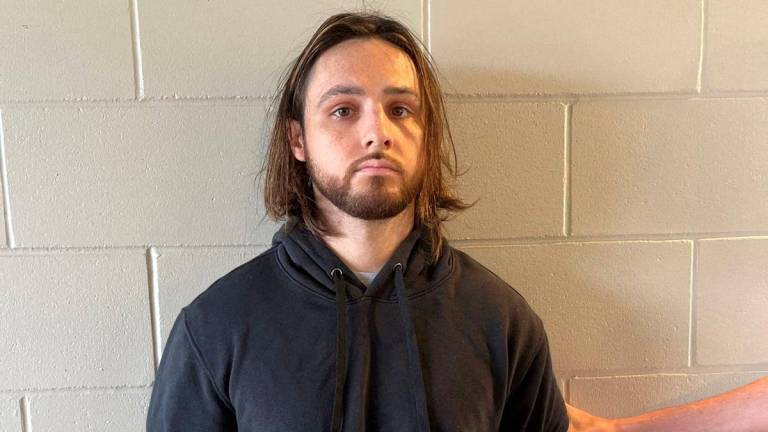 Jonathan Rinderknecht, 29, is posed after his arrest on charges that he intentionally ignited the Pacific Palisades Fire in Los Angeles, before his first court appearance in Orlando, Florida, U.S. October 8, 2025. - Department of Justice/Handout via REUTERSPIX