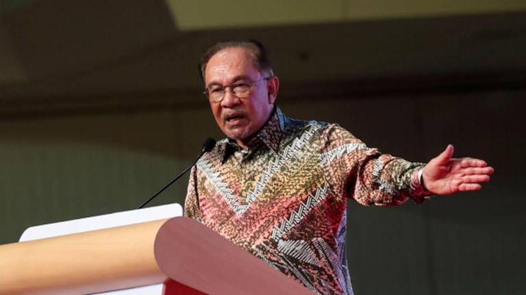 Prime Minister Datuk Seri Anwar Ibrahim delivers his speech at the highlight of the National Journalists’ Day (HAWANA) 2025 celebration, held at the World Trade Centre Kuala Lumpur (WTCKL) today. - BERNAMAPIX