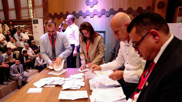 Members of electoral colleges count votes, on the day they vote for candidates of the new Syrian Parliament since Bashar al-Assad’s government was toppled, in Aleppo, Syria, October 5, 2025. - REUTERSpix