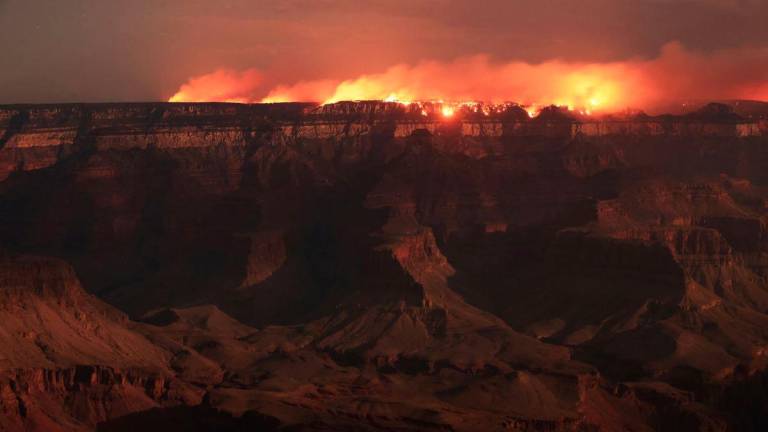 The Dragon Bravo Fire burns on the northern rim as seen from Mather Point on the southern rim of Grand Canyon, Arizona, U.S. July 15, 2025. - REUTERSPIX