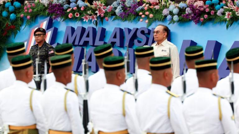 Prime Minister Datuk Seri Anwar Ibrahim arrives at the 2025 National Day celebration at Dataran Putrajaya today. - BERNAMA