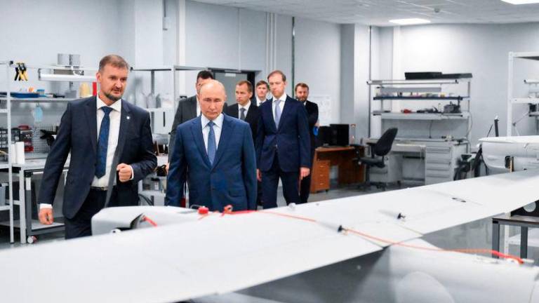 Russia’s President Vladimir Putin visits a drone production facility of the the Special Technology Centre in Saint Petersburg - REUTERSpix