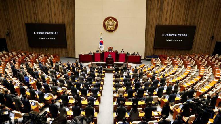 General view of lawmakers in the voting chamber during the plenary session for the impeachment vote of President Yoon Suk Yeol at the National Assembly in Seoul, South Korea, 07 December 2024. - REUTERSPIX