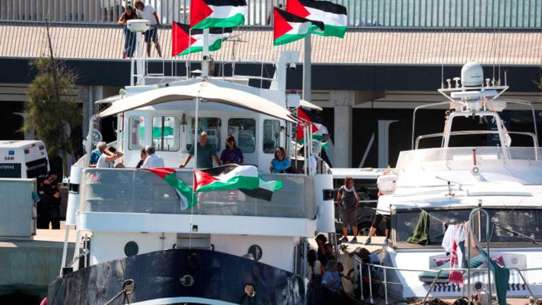 Swedish activist Greta Thunberg and other Global Sumud Flotilla members wait on their boat to depart to Gaza from Barcelona, Spain September 1, 2025, after stormy weather forced the flotilla to return to port earlier. - REUTERSPIX
