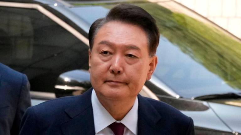 South Korea’s ousted President Yoon Suk Yeol, who is facing charges of orchestrating a rebellion when he declared martial law, arrives to attend his trial at the Seoul Central District Court in Seoul, South Korea, Monday, May 12, 2025. REUTERSpix