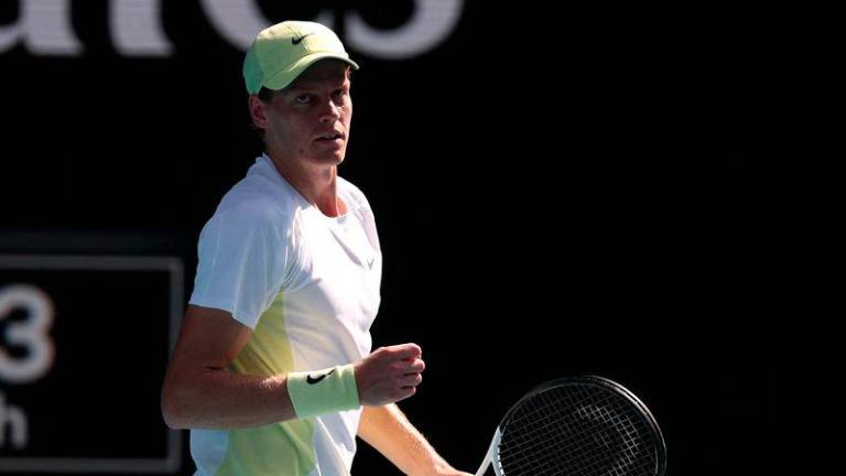 Italy's Jannik Sinner celebrates the match point against Chile’s Nicolas Jarry during their men's singles match on day two of the Australian Open tennis tournament in Melbourne on January 13, 2025. - AFPPIX