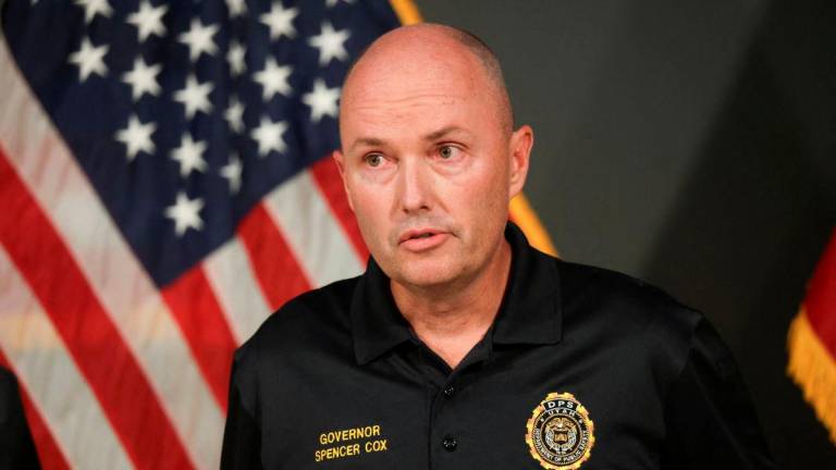 Utah Governor Spencer Cox speaks at a press conference after U.S. right-wing activist, commentator, Charlie Kirk, an ally of U.S. President Donald Trump, was fatally shot during an event at Utah Valley University, in Orem, Utah, U.S. September 10, 2025. REUTERS/Jim Urquhart
