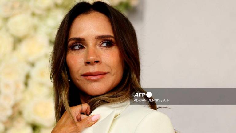 English fashion designer Victoria Beckham poses upon arrival to attend the world premiere of the three-part documentary series ‘Victoria Beckham’ at The Curzon Mayfair in London in October 8, 2025. (Photo by Adrian Dennis / AFP)
