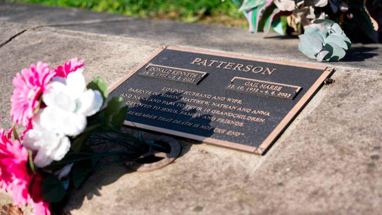 A memorial plaque for Don and Gail Patterson at the Korumburra general cemetary in Korumburra, Australia, June 24, 2025. - REUTERSPIX