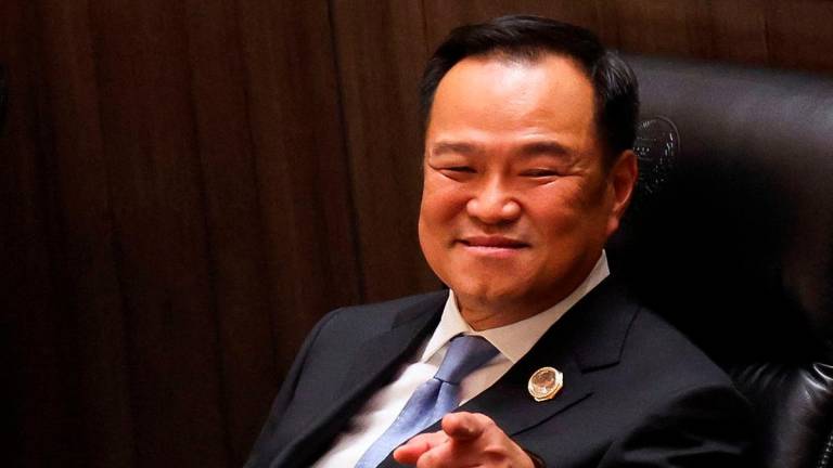 Bhumjaithai Party leader and prime ministerial candidate Anutin Charnvirakul gestures as he attend a voting session for a new prime minister at the parliament, following the Constitutional Court’s removal of Prime Minister Paetongtarn Shinawatra from office for an ethics violation, in Bangkok, Thailand, September 5, 2025. REUTERS/Chalinee Thirasupa