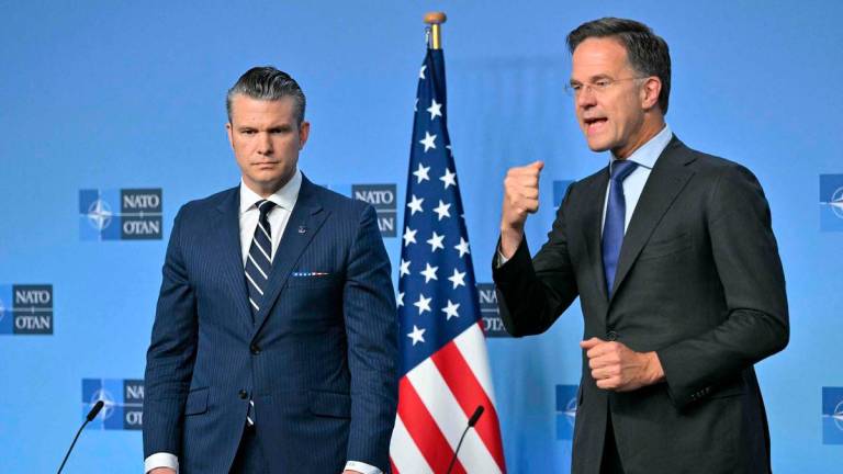 NATO Secretary General Mark Rutte (R) and US Secretary of Defence Pete Hegseth deliver remarks before a Defence Ministers meeting at the NATO headquarters, in Brussels, on June 5, 2025. AFP