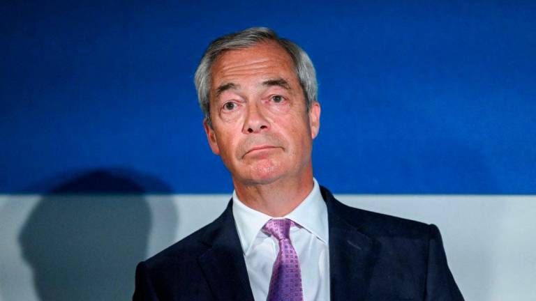FILE PHOTO: Britain’s Reform UK Party leader Nigel Farage speaks at a press conference in London, Britain, July 28, 2025. REUTERS/Jaimi Joy/File Photo