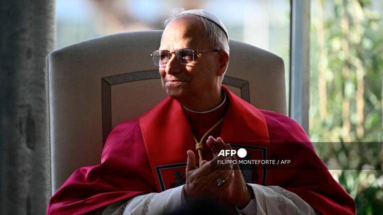 Pope Leo XIV applauds singer Andrea Bocelli and his son Matteo at the end of a Liturgy of the Word following the inauguration of the Borgo Laudato Si' Advanced Training Center at the papal summer residence in Castel Gandolfo, on September 5, 2025. - AFP