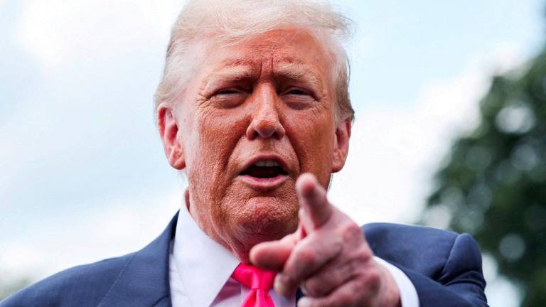 U.S. President Donald Trump speaks with reporters, as he departs for travel to Pennsylvania from the South Lawn at the White House in Washington, D.C. U.S., July 15, 2025. - REUTERSPIX