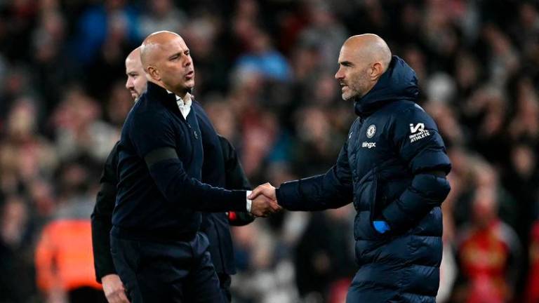 Liverpool’s manager Arne Slot shakes hand with Chelsea’s head coach Enzo Maresca following the Premier League football match between Liverpool and Chelsea at Anfield - AFPpix