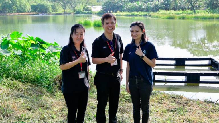 The team behind Lake 5’s revitalisation project at Kampar (from left): Dr Ooi, Dr Wong, and Dr Teoh