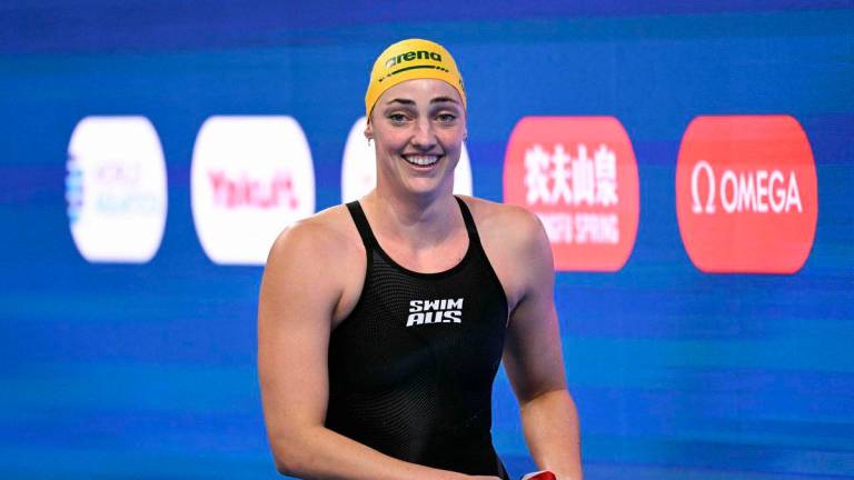 Australia’s swimmer Meg Harris reacts after winning the final of the women’s 50m freestyle swimming event during the 2025 World Aquatics Championships in Singapore on August 3, 2025. Photo by Oli SCARFF / AFP
