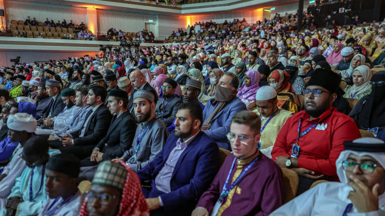 Participants from various countries attend the opening ceremony of the 65th International Al-Quran Recital and Memorisation Competition (MTHQA) at the Kuala Lumpur World Trade Centre (WTCKL) yesterday. This year's 65th MTHQA, running from Aug 2 to 9, 2025, features the theme 'Developing a MADANI Ummah' and brings together 71 participants from 49 countries. - BERNAMA