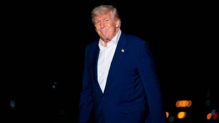 US President Donald Trump smiles after arriving on Marine One on the South Lawn of the White House in Washington, DC, on May 16, 2025, AFPpix