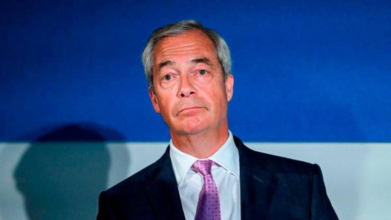 FILE PHOTO: Britain’s Reform UK Party leader Nigel Farage speaks at a press conference in London, Britain, July 28, 2025. REUTERS/Jaimi Joy/File Photo