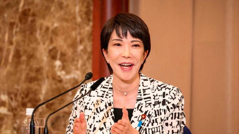 FILE PHOTO: Japan’s then-Economic Security Minister Sanae Takaichi speaks during a debate in Tokyo, Japan, Sept. 14, 2024. Takashi Aoyama/Pool via REUTERS/File Photo