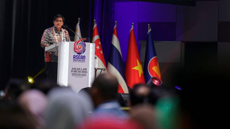 Minister in the Prime Minister’s Department (Law and Institutional Reform) Datuk Seri Azalina Othman Said delivers her speech at the ASEAN Law Forum 2025 themed Enhancing Access to Justice in the ASEAN Economic Community: Bridging Legal Cooperation for Inclusive Growth in the Digital Age in Kuala Lumpur Convention Centre today. - BERNAMA