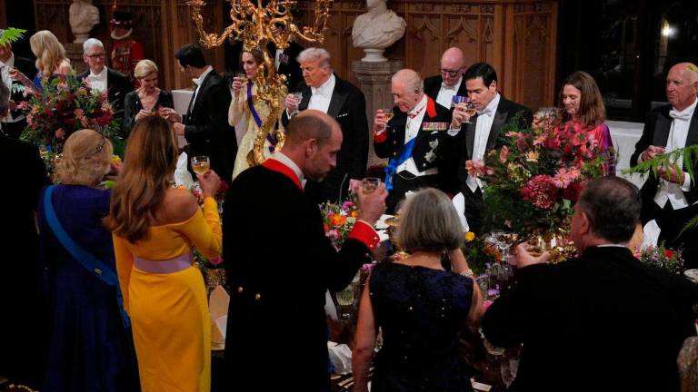 US President Donald Trump, alongside King Charles III, the Princess of Wales, US Secretary of State Marco Rubio, Queen Camilla, First Lady Melania Trump, the Prince of Wales and guests at the state banquet for the US President and First Lady at Windsor Castle, Berkshire, on day one of their second state visit to the UK, Wednesday September 17, 2025. Yui Mok/Pool via REUTERS