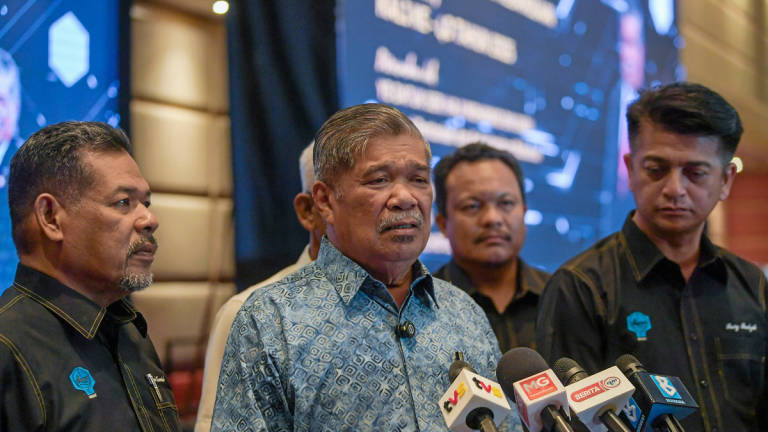 Minister of Agriculture and Food Security, Datuk Seri Mohamad Sabu, at a press conference during the Opening Ceremony of the 40th Annual General Meeting of Nekmat at a hotel today. – BERNAMA