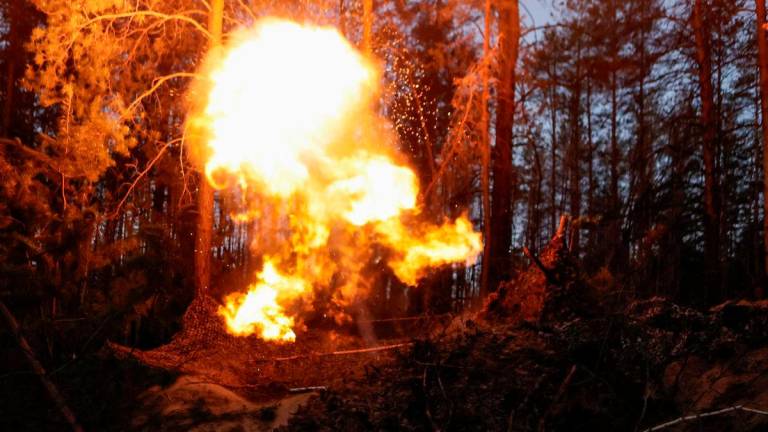 Service members of the 115th Separate Mechanized Brigade of the Ukrainian Armed Forces fire a mortar towards Russian troops, at a position in a front line, amid Russia’s attack on Ukraine, in Donetsk region, Ukraine May 16, 2025. REUTERSpix