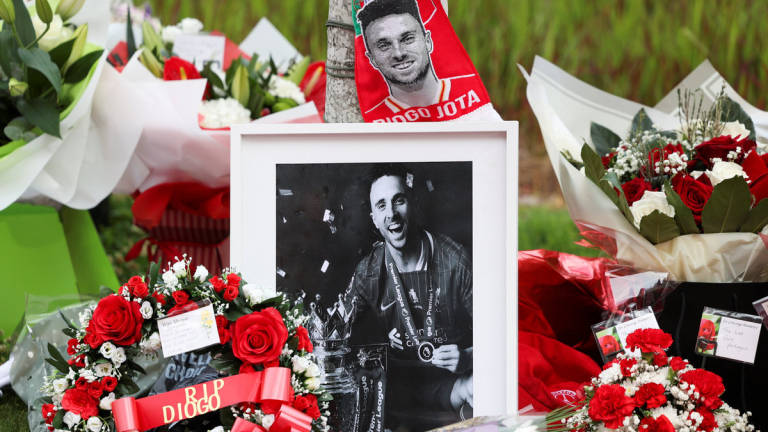 Flower tributes are left outside Liverpool’s Anfield Stadium after Liverpool’s Portuguese soccer player Diogo Jota died in a car crash near Zamora, Spain, in Liverpool, Britain, July 4, 2025. - REUTERS