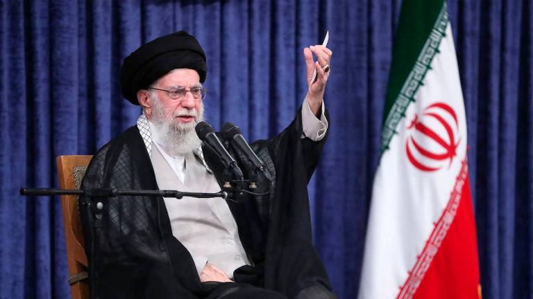 This handout picture released by the office of Iran’s Supreme Leader Ayatollah Ali Khamenei shows him addressing the crowd during a meeting with the head of the judiciary and other officials in Tehran on July 16, 2025. (Photo by KHAMENEI.IR / AFP)
