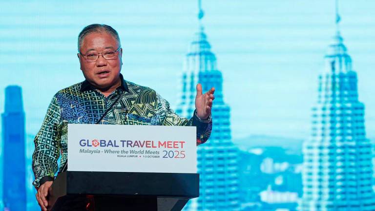 Tourism, Arts and Culture Minister Datuk Seri Tiong King Sing delivers his speech at the Global Travel Meet Gala Dinner 2025 and Launching of Calendar of Event 2026 Tourism Malaysia at a hotel yesterday.