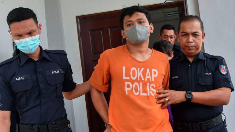 A married couple was charged in the Magistrates’ Court here today with two offences involving the trafficking and possession of cannabis and methamphetamine two weeks ago. - BERNAMAPIX