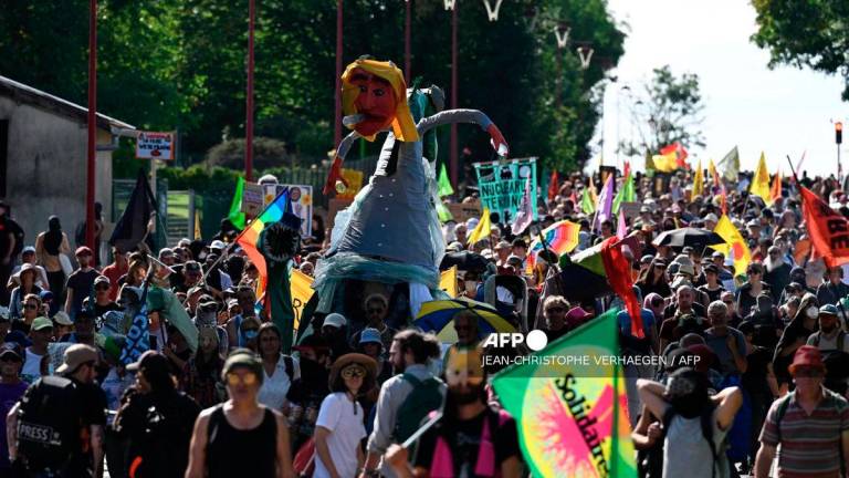 Anti-nuclear activists demonstrate during a march called La manif du futur (Protest of the future) near ANDRA laboratory and radioactive waste disposal site in Bure, northeastern France on September 20, 2025. - AFP