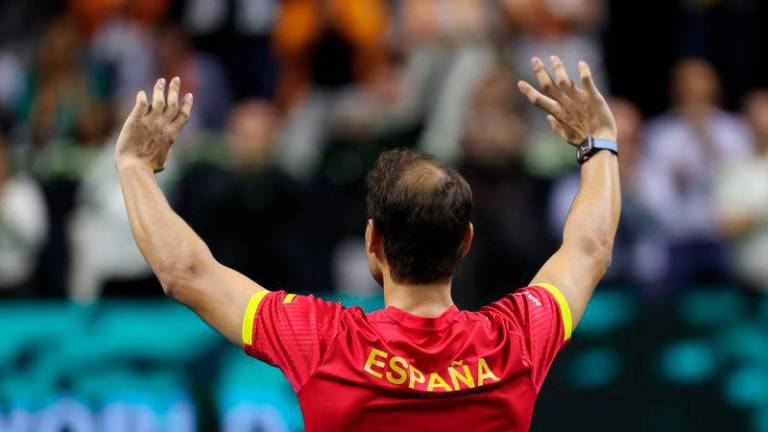 Rafael Nadal greets the spectators during a tribute to his career at the end of the quarter-final doubles match between Netherlands and Spain during the Davis Cup Finals - AFPpix