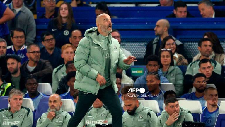 Chelsea's Italian head coach Enzo Maresca shouts instructions to his players from the touchline during the UEFA Champions League, league phase football match between Chelsea and Benfica at Stamford Bridge in London on September 30, 2025. - AFP