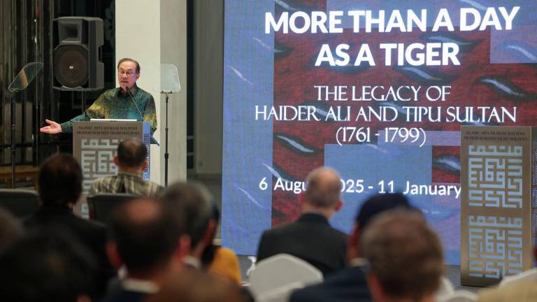 Prime Minister Datuk Seri Anwar Ibrahim addressing the launching of the 'More Than A Day As A Tiger' Exhibition at the Islamic Arts Museum Malaysia - BERNAMAPIX