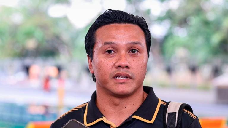 National diving camp coach Nor Aznizal Najib speaking at a press conference at the National Aquatic Centre recently. – BERNAMA